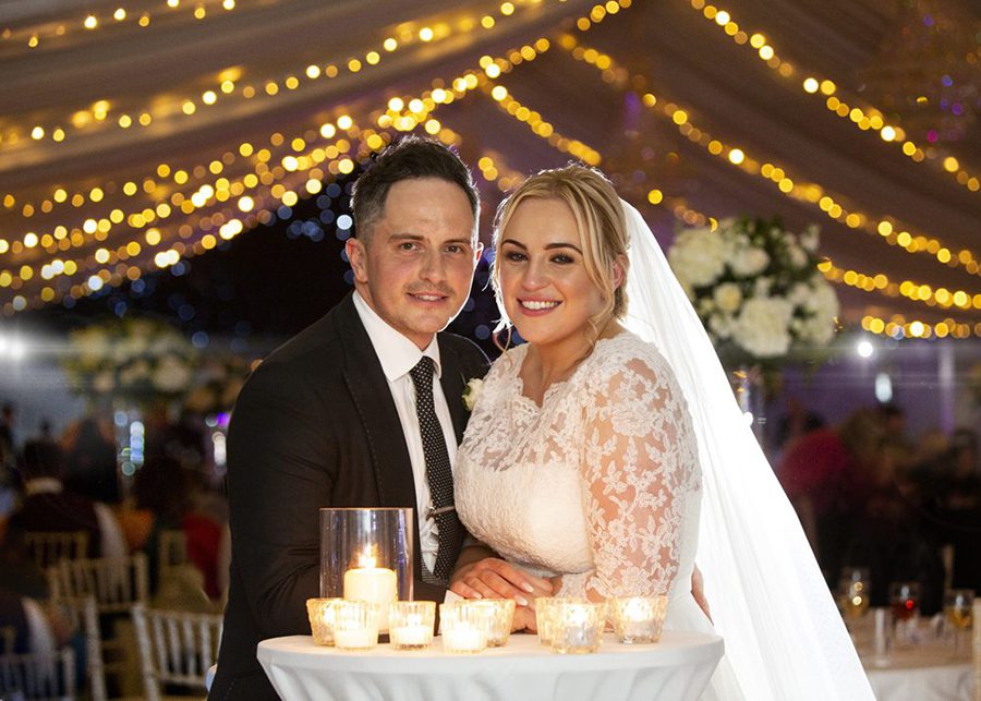 Couple enjoy at drink at their Mar Hall Wedding